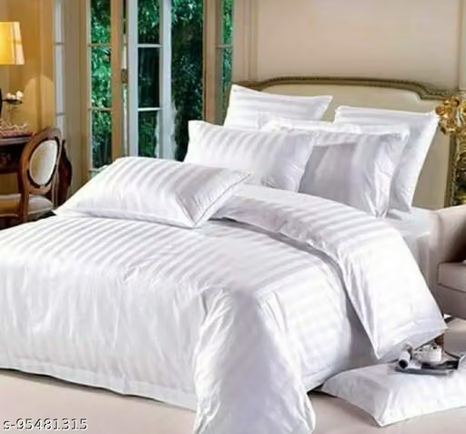 100% Cotton Duvet Covers — on a styled bed