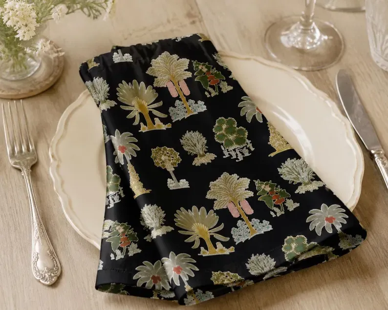 Black Cocktail Napkins — folded beside drinks
