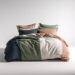 Coastal Bedspread — draped over a bed