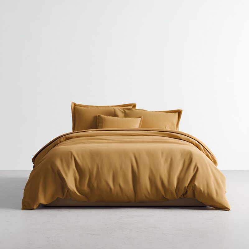Cotton Sateen Bed Sheets — styled on a neatly made bed