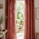 Linen Grommet Curtains — hung at a window