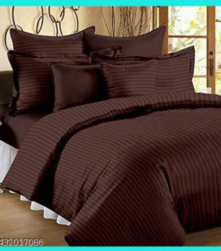 Satin Sheets — styled on a neatly made bed