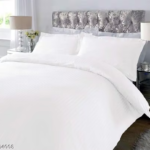 White Bed Sheets — styled on a neatly made bed