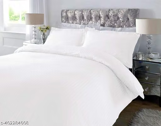 White Bed Sheets White Bed Sheets — styled on a neatly made bed